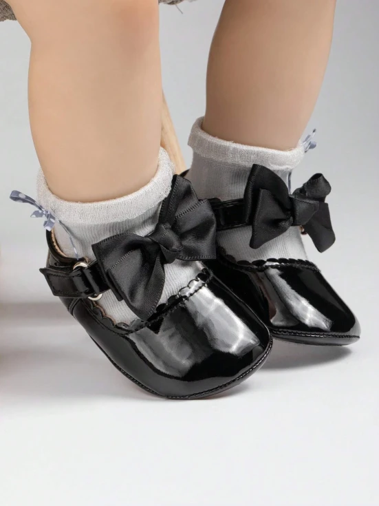 baby shoes for girls, elegant baby shoes, black baby shoes, shoes for toddlers, comfortable baby shoes, high-quality baby shoes, baby shoe size guide