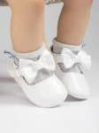 white baby shoes, elegant baby shoes, patent baby shoes, shoes for infants, comfortable baby shoes, high-quality baby shoes, baby shoe size guide