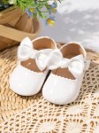 white baby shoes, elegant baby shoes, patent baby shoes, shoes for infants, comfortable baby shoes, high-quality baby shoes, baby shoe size guide