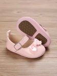pink patent baby shoes, bow-adorned baby shoes, elegant baby shoes, shoes for infants, comfortable baby shoes, high-quality patent shoes, baby shoe size guide