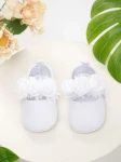 white baby shoes, embroidered flowers, elegant baby shoes, shoes for infants, comfortable baby shoes, high-quality shoes, baby shoe size guide, floral baby shoes, stylish baby shoes