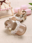Golden baby shoes, baby footwear, crown adorned shoes, first step shoes, soft sole baby shoes, baby shoe sizes, elegant baby shoes, baby shoe design, baby shoe material