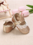 Golden baby shoes, baby footwear, crown adorned shoes, first step shoes, soft sole baby shoes, baby shoe sizes, elegant baby shoes, baby shoe design, baby shoe material