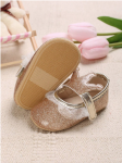 Golden baby shoes, baby footwear, crown adorned shoes, first step shoes, soft sole baby shoes, baby shoe sizes, elegant baby shoes, baby shoe design, baby shoe material