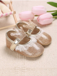 Golden baby shoes, baby footwear, crown adorned shoes, first step shoes, soft sole baby shoes, baby shoe sizes, elegant baby shoes, baby shoe design, baby shoe material