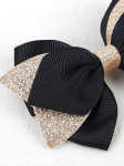 Elegant hair clips, black bow clips, girls' accessories Ireland, stylish hair accessories, hair clips for sensitive skin, hair clips for girls, versatile hair clips, black and gold clips, high-quality hair clips, children's fashion accessories
