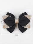 Elegant hair clips, black bow clips, girls' accessories Ireland, stylish hair accessories, hair clips for sensitive skin, hair clips for girls, versatile hair clips, black and gold clips, high-quality hair clips, children's fashion accessories