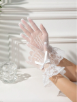 communion gloves for girls, white gloves for communion, First Holy Communion accessories, elegant gloves for girls, girls’ gloves with lace, satin bow gloves, special occasion gloves, wedding gloves for girls, breathable gloves for ceremonies