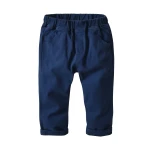 Navy trousers with leather-accented braces for boys' communion