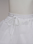 Adjustable satin waistband on snow-white petticoat