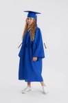 Royal blue graduation gown flowing on young scholar in ceremony – Cobalt Crest Ensemble