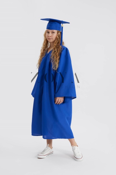 Royal blue graduation gown flowing on young scholar in ceremony – Cobalt Crest Ensemble