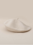 Top view of kids beret with neat pom pom detail