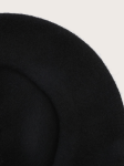 Top view of girls black beret with classic stalk