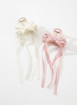 Blush and ivory satin bow hair clips set of two on white background