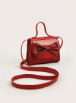 Red girls glitter party handbag with bow front view