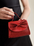 Girls red occasion bag with top handle styled for Communion