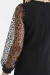 Close-up of sequin-adorned sheer sleeve on Vivienne girls dress