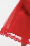 Close up of floral lace bodice and puffed long sleeves on Kayra red girls dress