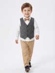 Boy in Enzo Heritage Ensemble at Irish Communion – Crisp white shirt and amber bow tie.