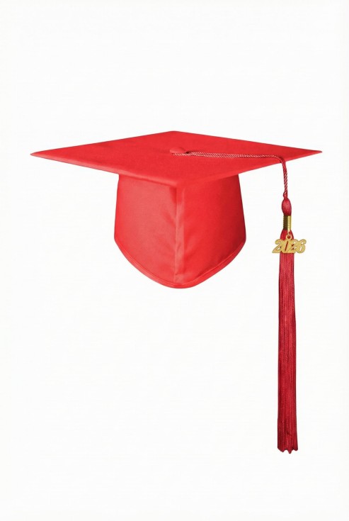 Vibrant red Scarlet Scholar Graduation Cap on young graduate in Irish schoolyard.