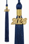 Close-up of tassel and 2026 charm on premium navy graduation cap