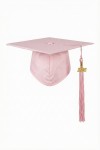 Close-up of matching pink academic cap with tassel