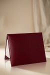 Burgundy diploma cover with white interior – front view