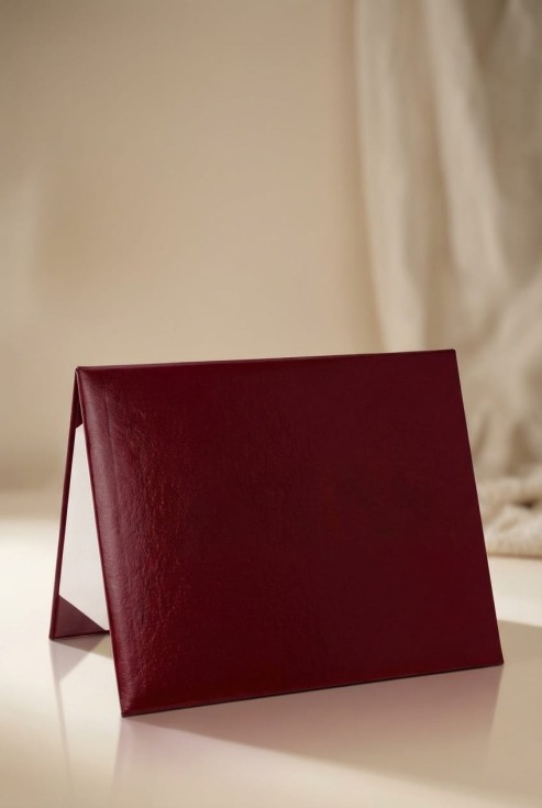 Burgundy diploma cover with white interior – front view