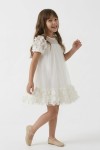 girls tulle dress detail, Romy 3D flowers close up, tulle fabric detail, handcrafted flower appliques