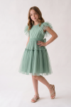 Mint green Paola girls' tulle dress, side view with full flared skirt
