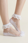 White ruffle socks styled with shoes for a Communion outfit
