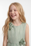 Bella sage green girls dress, back view with zip fastening