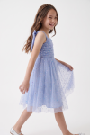 Rina light cornflower blue tulle dress for girls with colourful sequins – girl in motion, side view
