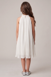 Rozalia white pleated dress for girls – back view, pearl collar fastened with a button