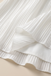 Rozalia white dress for girls – detail of the pleated skirt and smooth lining