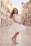 Rozalia white pleated dress for girls in the old town – twirling