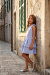 Harper light blue sleeveless dress for girls – styled outdoors, full length