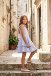 Harper light blue dress for girls with a two-layer skirt – outdoors, full length