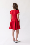 Rumi red dress for girls – back with zip and gathering at the sides of the skirt