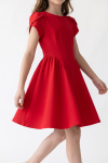Rumi red dress for girls – arched seams and gathered sides of the skirt