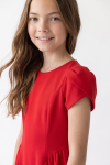 Rumi red dress for girls – tulip sleeve and fabric texture, three-quarter view