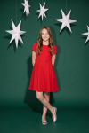 Rumi red dress for girls – green backdrop with white stars, full length