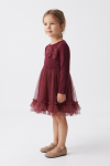 Iga burgundy long-sleeved dress for girls – three-quarter side view, full length
