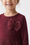 Iga burgundy dress for girls – detail of the tulle bow and round neckline