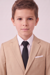 Liam beige suit for boys – blazer lapels and black tie, close-up from the chest up