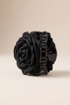 Black flower claw clip for girls – side view of the teeth and spring